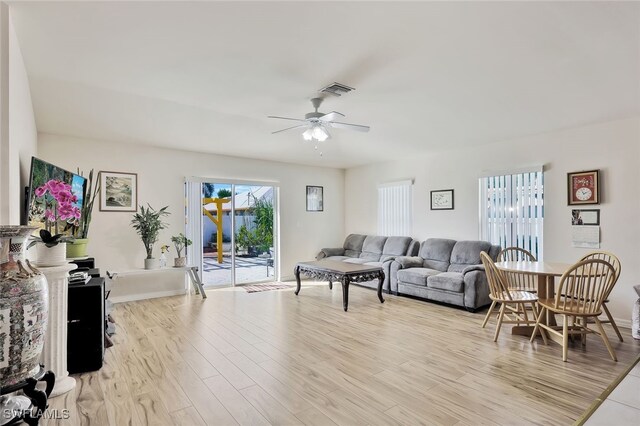 4326 SW 9th Ave, Cape Coral, FL 33914 - living room featuring ceiling fan and light wood-style flooring