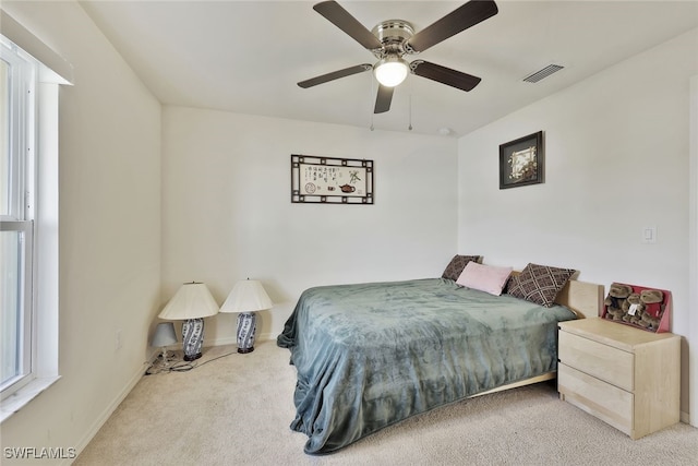 4326 SW 9th Ave, Cape Coral, FL 33914 - bedroom with carpet floors, baseboards, and a ceiling fan
