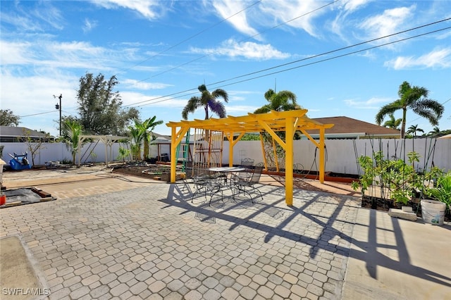 4326 SW 9th Ave, Cape Coral, FL 33914 - fenced backyard featuring a pergola and a patio area