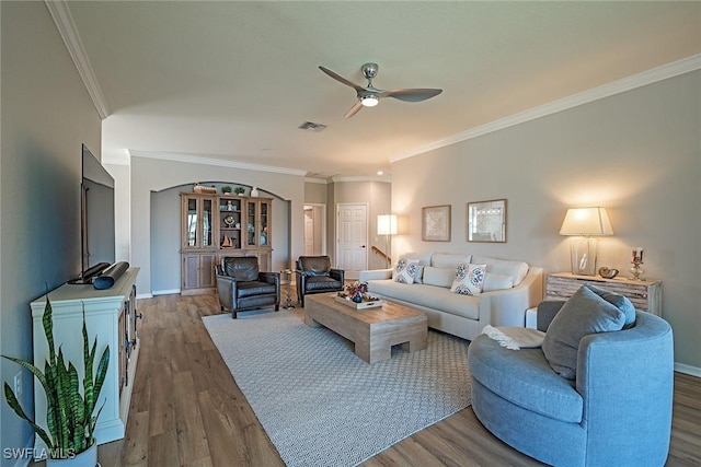 3153 Aviamar Cir Unit 202, Naples, FL 34114 - living area featuring a ceiling fan, wood finished floors, ornamental molding, and baseboards