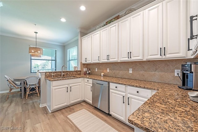 3153 Aviamar Cir Unit 202, Naples, FL 34114 - kitchen with stainless steel dishwasher, a sink, crown molding, white cabinets, and recessed lighting
