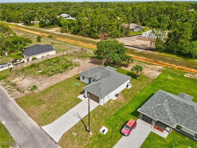 2605 Darlene Pl, Lehigh Acres, FL 33971 - aerial view of a heavily wooded area