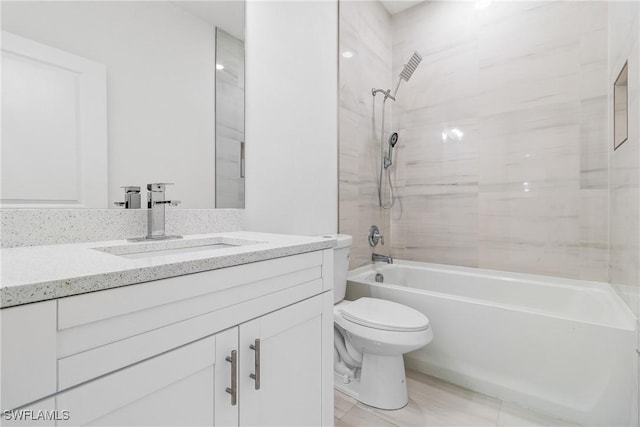 2605 Darlene Pl, Lehigh Acres, FL 33971 - bathroom featuring vanity, toilet, and bathtub / shower combination