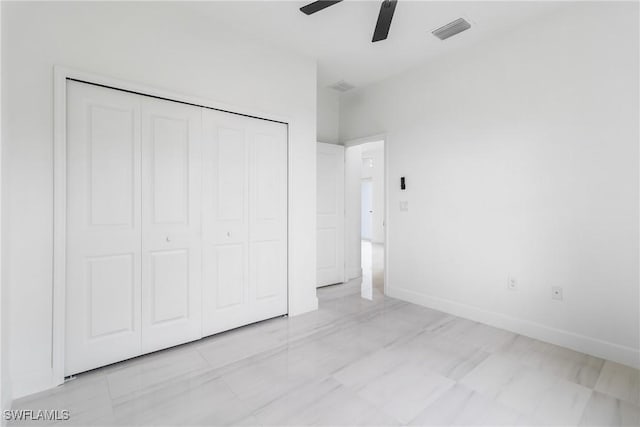 2605 Darlene Pl, Lehigh Acres, FL 33971 - unfurnished bedroom featuring a closet, ceiling fan, and baseboards