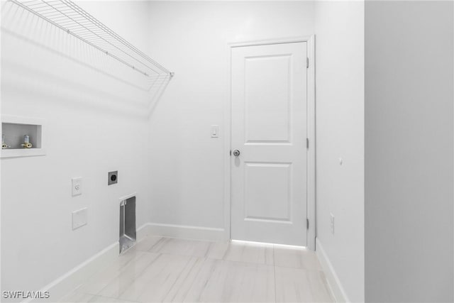 2605 Darlene Pl, Lehigh Acres, FL 33971 - washroom featuring electric dryer hookup, hookup for a washing machine, and baseboards