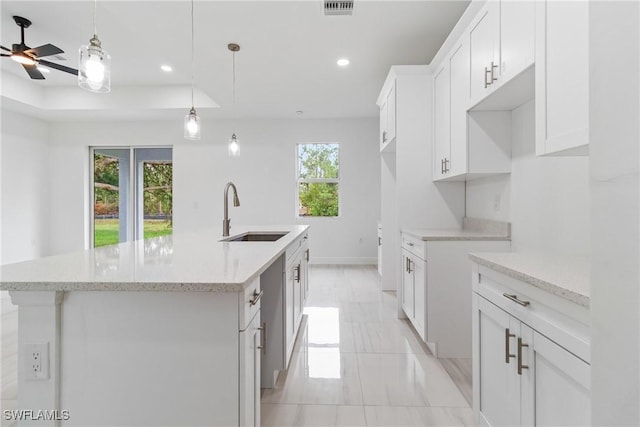 2605 Darlene Pl, Lehigh Acres, FL 33971 - kitchen featuring a sink, an island with sink, white cabinets, recessed lighting, and ceiling fan