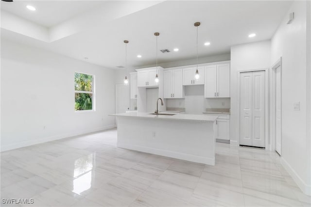 2605 Darlene Pl, Lehigh Acres, FL 33971 - kitchen featuring a sink, white cabinetry, a kitchen island with sink, light countertops, and recessed lighting