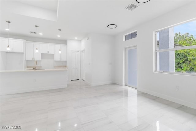 2605 Darlene Pl, Lehigh Acres, FL 33971 - unfurnished living room with baseboards and recessed lighting