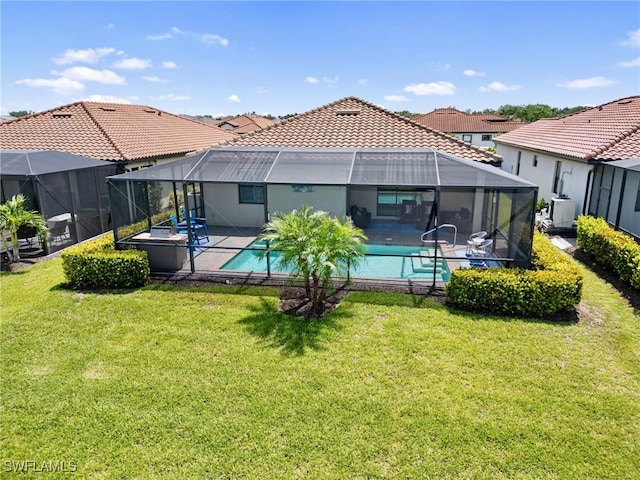 11992 Arbor Trace Dr, Fort Myers, FL 33913 - rear view of house with an outdoor pool, a patio, a yard, and a lanai
