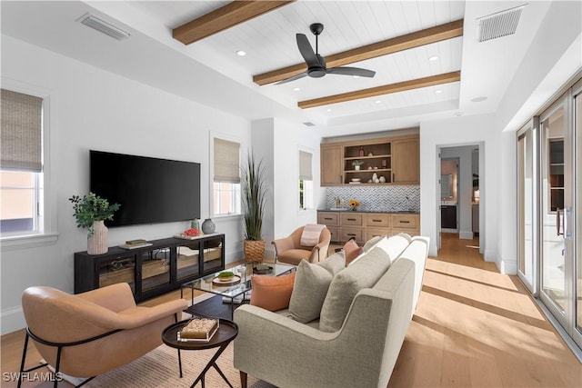 845 11th Ave S, Naples, FL 34102 - living room with beam ceiling, light wood-type flooring, ceiling fan, baseboards, and recessed lighting