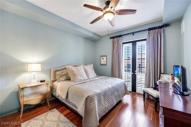 23159 Amgci Way Unit 302, Estero, FL 33928 - bedroom featuring wood finished floors, access to outside, and ceiling fan