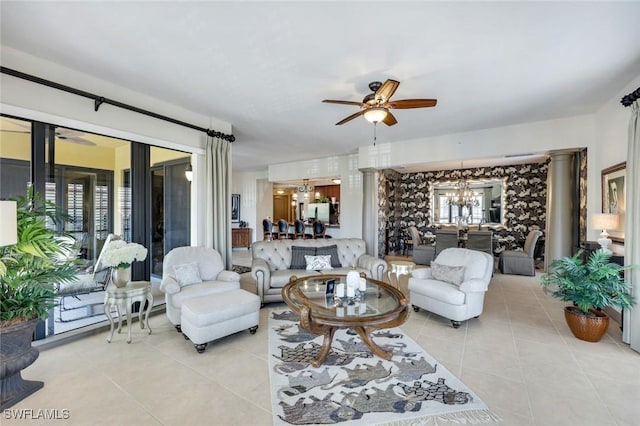 23159 Amgci Way Unit 302, Estero, FL 33928 - living area with a chandelier, light tile patterned floors, and a ceiling fan