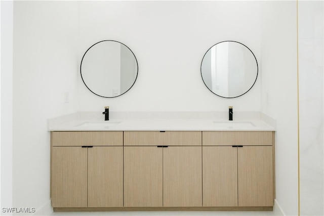 718 Calvin Ave, Lehigh Acres, FL 33972 - bathroom with double vanity and baseboards