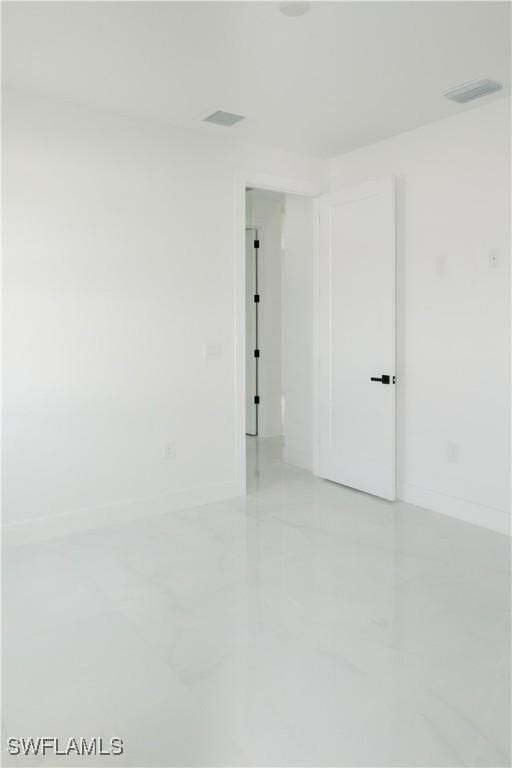 718 Calvin Ave, Lehigh Acres, FL 33972 - empty room featuring baseboards