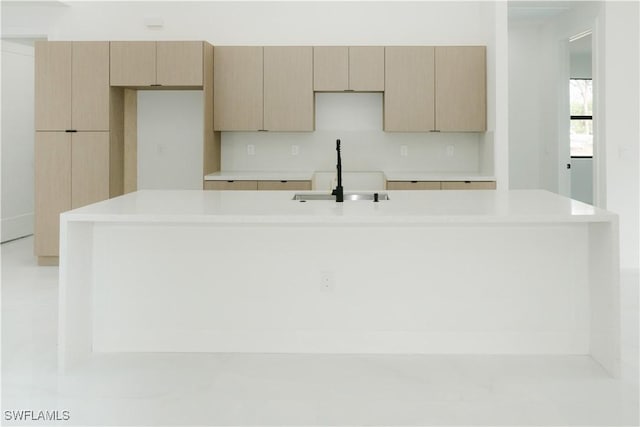 718 Calvin Ave, Lehigh Acres, FL 33972 - kitchen with a sink, a spacious island, and light countertops