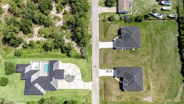 718 Calvin Ave, Lehigh Acres, FL 33972 - bird's eye view of a pool