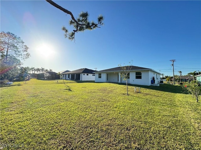 2933 Van Buren Pkwy, Cape Coral, FL 33993 - view of green lawn