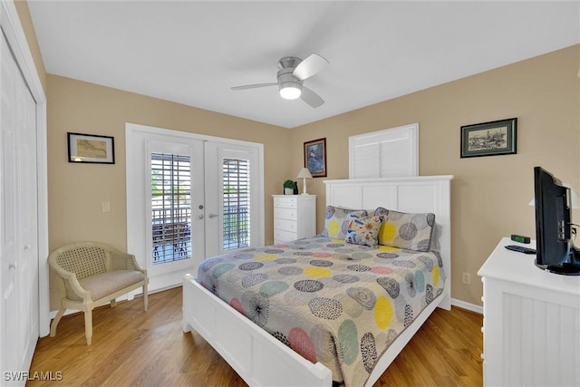 291 Mango St, Fort Myers Beach, FL 33931 - bedroom with light wood finished floors, french doors, access to outside, baseboards, and ceiling fan