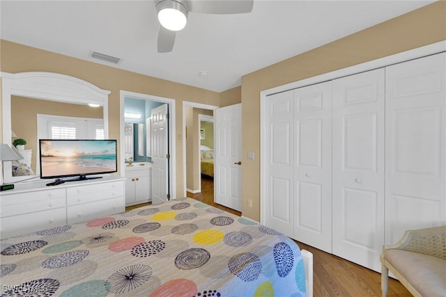 291 Mango St, Fort Myers Beach, FL 33931 - bedroom featuring wood finished floors, a closet, and ceiling fan