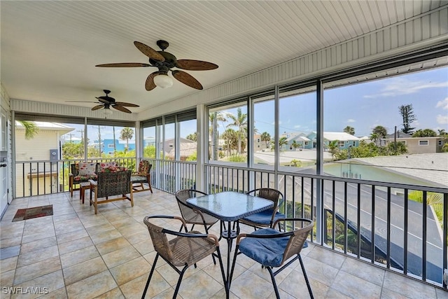 291 Mango St, Fort Myers Beach, FL 33931 - sunroom with a ceiling fan and a residential view