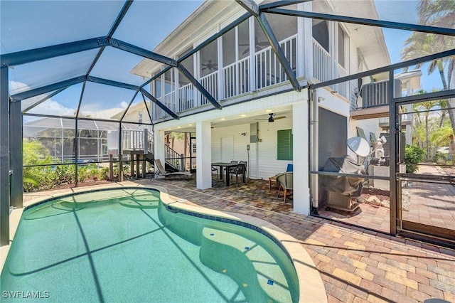 291 Mango St, Fort Myers Beach, FL 33931 - outdoor pool with a ceiling fan, a patio, and glass enclosure