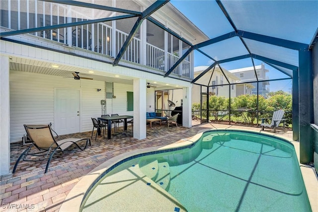 291 Mango St, Fort Myers Beach, FL 33931 - swimming pool featuring ceiling fan, a patio, a lanai, and outdoor dining space