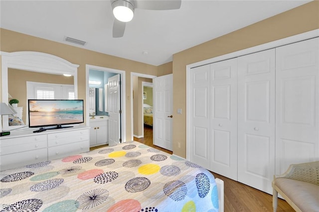 291 Mango St, Fort Myers Beach, FL 33931 - bedroom featuring wood finished floors, a closet, and a ceiling fan