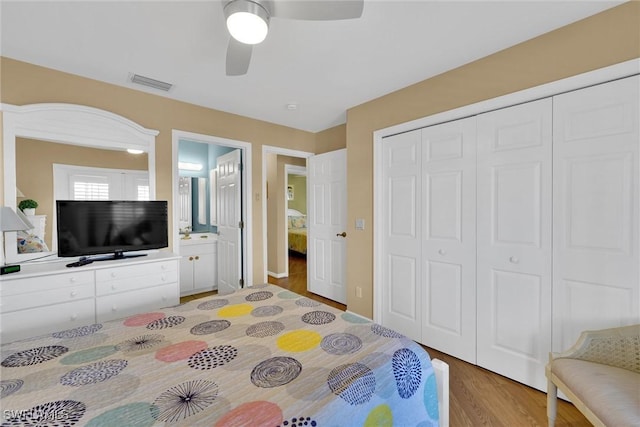 291 Mango St, Fort Myers Beach, FL 33931 - bedroom featuring wood finished floors, a closet, and a ceiling fan