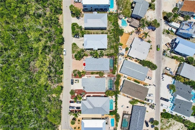 291 Mango St, Fort Myers Beach, FL 33931 - aerial view of property and surrounding area featuring nearby suburban area
