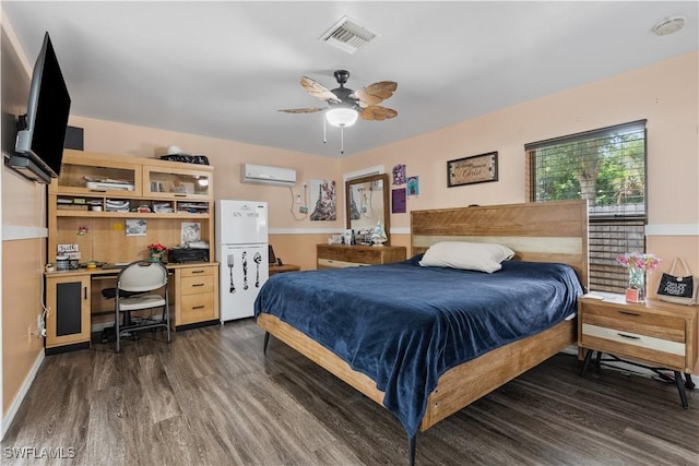 2909 48th St SW, Lehigh Acres, FL 33976 - bedroom featuring an AC wall unit, dark wood-type flooring, freestanding refrigerator, and baseboards