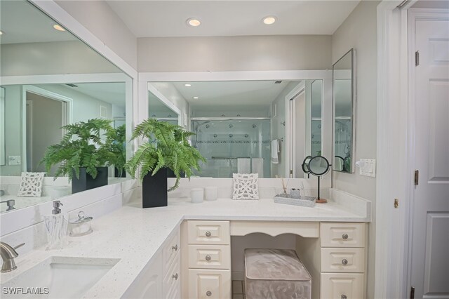 1925 Clifford St Unit 101, Fort Myers, FL 33901 - bathroom featuring double vanity, a shower stall, and recessed lighting