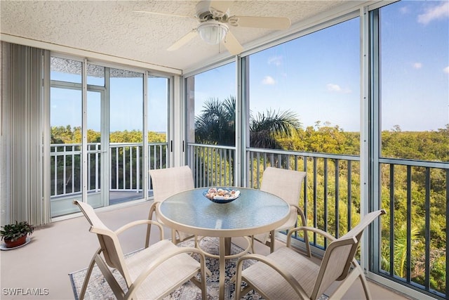 5550 Heron Point Dr W Unit 305, Naples, FL 34108 - sunroom featuring a textured ceiling