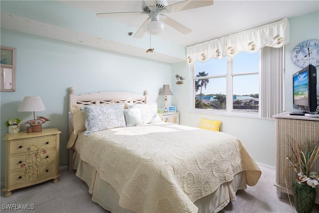 5550 Heron Point Dr W Unit 305, Naples, FL 34108 - bedroom with carpet and a ceiling fan