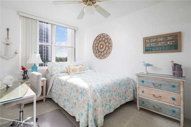 5550 Heron Point Dr W Unit 305, Naples, FL 34108 - bedroom with carpet flooring and a ceiling fan
