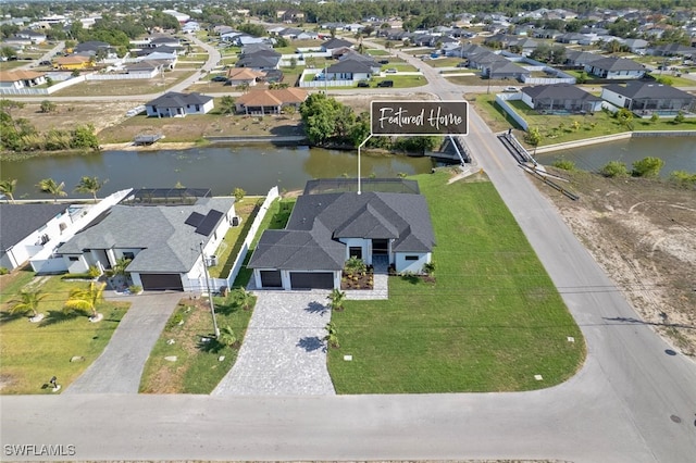 220 NE 6th St, Cape Coral, FL 33909 - aerial view of residential area with a large body of water