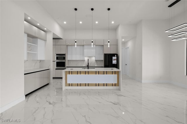 220 NE 6th St, Cape Coral, FL 33909 - kitchen featuring modern cabinets, white cabinets, freestanding refrigerator, recessed lighting, and stainless steel double oven