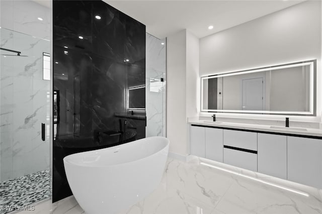 220 NE 6th St, Cape Coral, FL 33909 - bathroom featuring marble tiled floors, a marble finish shower, a freestanding tub, double vanity, and recessed lighting