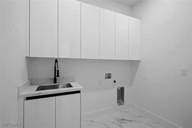 220 NE 6th St, Cape Coral, FL 33909 - laundry room with cabinet space, baseboards, washer hookup, marble finish flooring, and electric dryer hookup