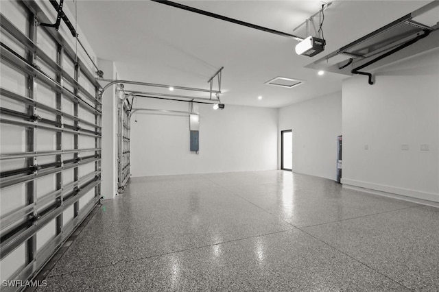 220 NE 6th St, Cape Coral, FL 33909 - garage with a garage door opener and electric panel