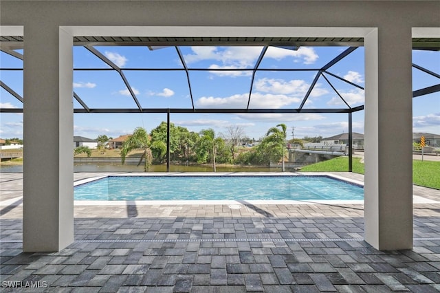 220 NE 6th St, Cape Coral, FL 33909 - outdoor pool with a patio and glass enclosure