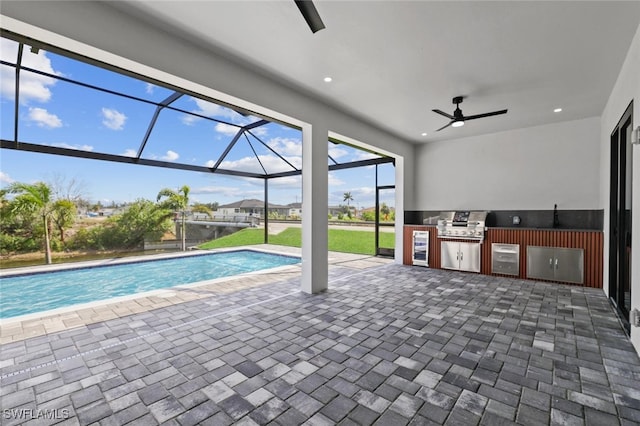 220 NE 6th St, Cape Coral, FL 33909 - swimming pool with a ceiling fan, a patio area, and glass enclosure