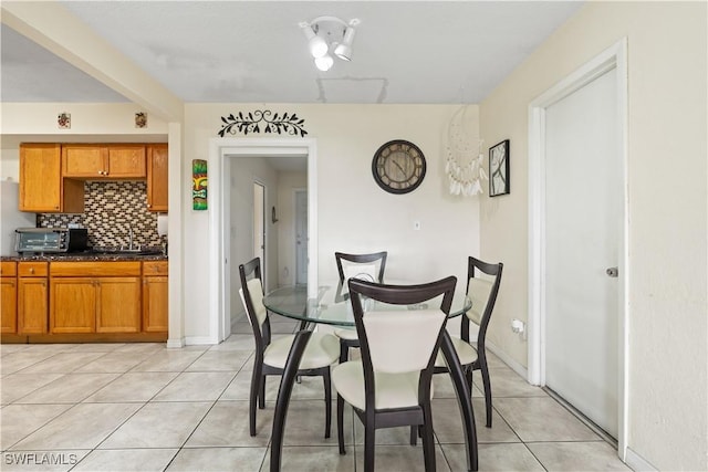 804 Alcala Ave, Lehigh Acres, FL 33936 - dining area with light tile patterned floors