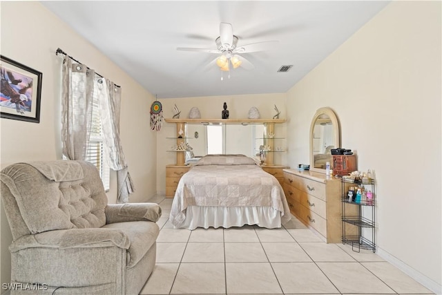 804 Alcala Ave, Lehigh Acres, FL 33936 - bedroom with light tile patterned flooring and a ceiling fan