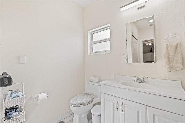 804 Alcala Ave, Lehigh Acres, FL 33936 - half bath with toilet, vanity, and baseboards