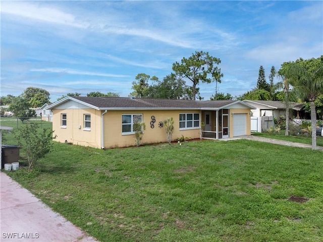 804 Alcala Ave, Lehigh Acres, FL 33936 - ranch-style home featuring an attached garage and concrete driveway