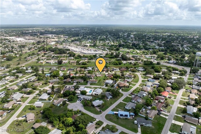 804 Alcala Ave, Lehigh Acres, FL 33936 - aerial view of property and surrounding area featuring nearby suburban area