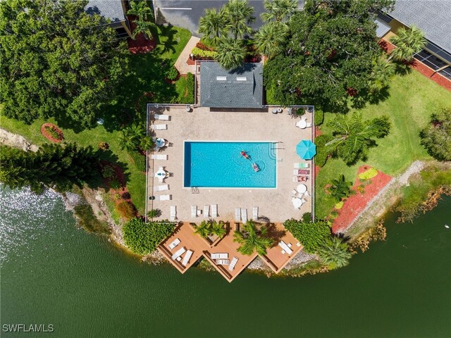 1190 Yesica Ann Cir Unit B205, Naples, FL 34110 - drone / aerial view of a pool area and a nearby body of water