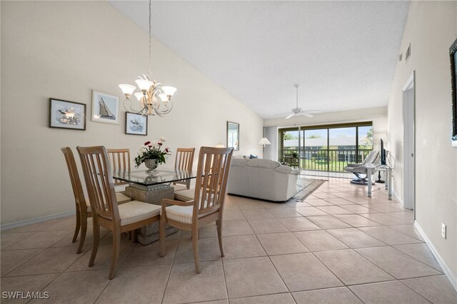 1190 Yesica Ann Cir Unit B205, Naples, FL 34110 - dining room with light tile patterned floors, a chandelier, high vaulted ceiling, and a ceiling fan