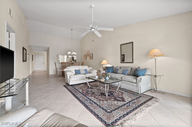 1190 Yesica Ann Cir Unit B205, Naples, FL 34110 - living area with light tile patterned floors, ceiling fan, high vaulted ceiling, and a chandelier