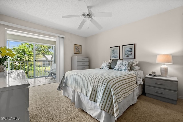 1190 Yesica Ann Cir Unit B205, Naples, FL 34110 - carpeted bedroom with access to outside, a ceiling fan, and a textured ceiling